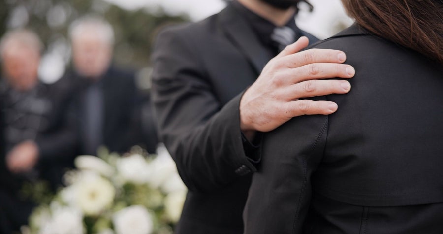 A person being consoled